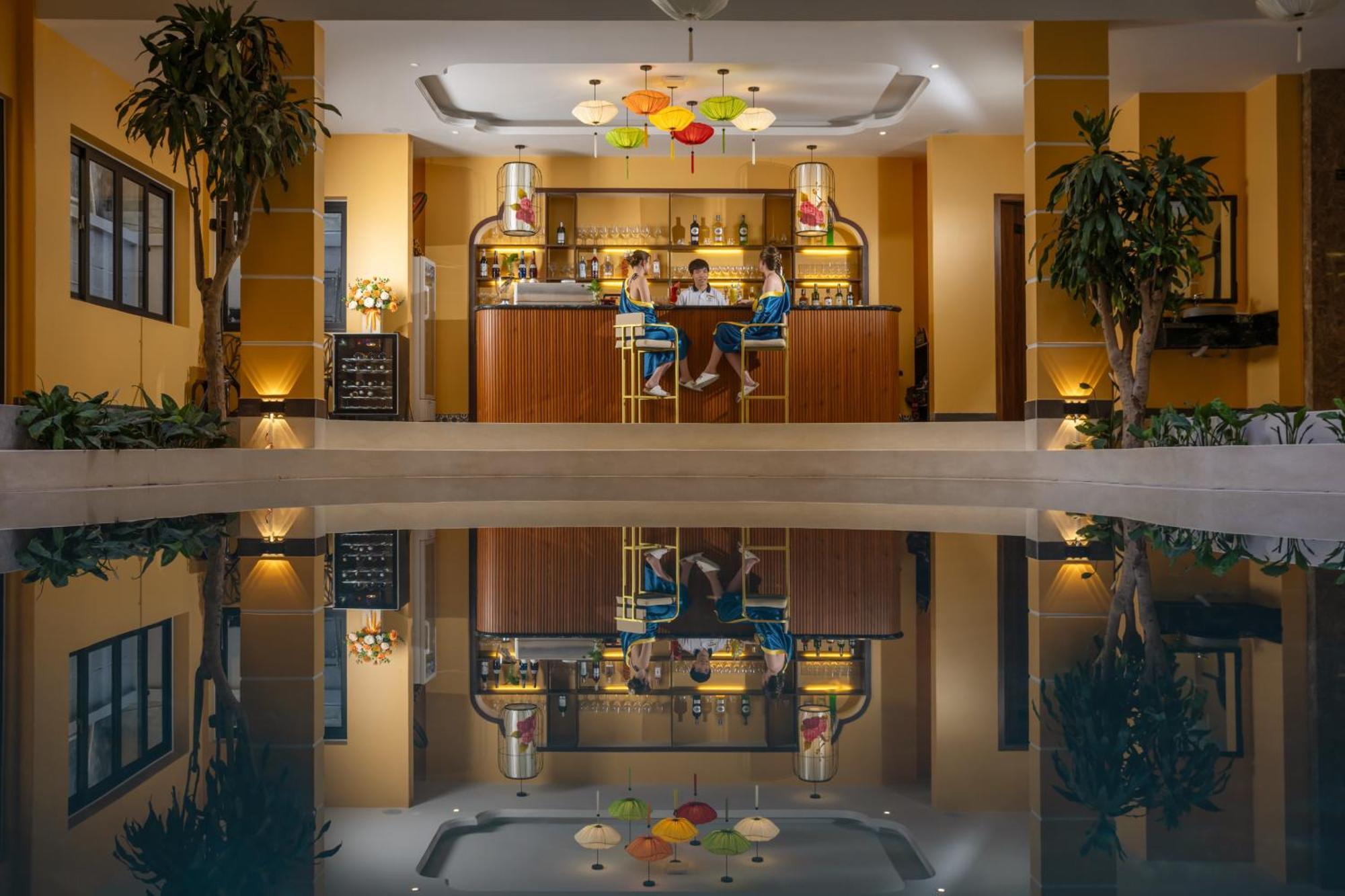 Babylon Riverside & Отель Хойан